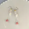 Boucles d'oreilles pendantes style chinois rétro pierre naturelle long gland pour les femmes conception avec un sens unique de papillon de luxe