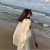 Camicette da donna Camicetta alla moda 2023 Camicie da donna eleganti e giovanili Protezione solare da spiaggia Rilassante vacanza Vestiti a maniche a bolle per
