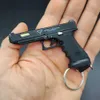 G34 Pistola TTI Velocità Chasing Shell Espulsione Pistola Lega Miniatura Pistola giocattolo Portachiavi Sopravvivenza Modello di pistola Proiettile staccabile Lancio 2082 Migliore qualità