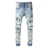 Jeans de designer Jean Amirres Denim Hommes Pantalons 2023 Vêtements pour hommes Version coréenne de la mode High-Street Patch Micro Élastique Lettre Brodée Hommes 0BS1