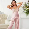 Kvinnors sömnkläder jxgarb 2 bit satin kvinnor sexig spaghetti rem pajama set v halskvinna silk pijama cross spets nattliga hemkläder