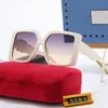 Lunettes de soleil design pour hommes et lunettes de soleil pour femmes G lettre snuglasses voyagent sur la plage moto fête protection UV400 mode style chaud ont 7 couleurs
