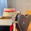 حقائب مصممة محافظ HH Boite Chapeau Souple مصممة مصممة مصغرة أكياس القلب الأحمر حقيبة شكل كيس العملة المعدنية