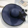 Wide Brim Hats Bucket Hats Women Summer Beach Travel Straw Hat Korean Seaside Big Hat Brim Sunblock Sunshade Holiday Foldable Fashion Big Cool Hat 230511