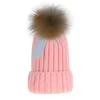 Mode Hiver Fluff Balls Bonnets avec Ornements Hommes Femmes Classique Designer Tricoté Chapeaux Fourrure De Raton Laveur Pompons Skull Caps pour Unisexe