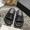 2023-Summer Shops Slippers que vendem mais com textura côncava e convexa de alta qualidade masculino e feminino casual e confortável feminino sapatos