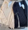Damen-Oberteile mit bestickter Spitze, darunter Designer-Herbst-Pullover, sexy, transparente Pullover mit langen Ärmeln, T-Shirt in beige-schwarzen Strumpfhosen, trendige Kleidung 2023
