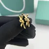 Бренд классический обручальный кольцо модного дизайнера дизайнера для женщин Высококачественные 18 золотых роскошных кольцевых украшений