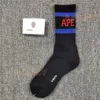 Hommes Chaussettes Skateboard Mode Mans Lettre Imprimé Chaussettes Tête De Singe Motif Hip Hop Chaussette De Sport Taille Libre 21 Couleurs