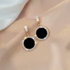 Stud version of hot new black round rhinestone earrings fashion simple and versatile temperament female wedding earrings jewel