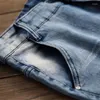 Erkek Kotlar Sonbahar Kış Kış Avrupa Amerikan İşlemeli Erkekler Düz Elastik Kat Moda Motosiklet Pantolon Yırtık Giyim