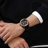 Мужчины смотрят водонепроницаемые 41 -мм дизайнерские часы -резиновые наручные часы.