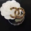 20 Style Märkesdesigner C dubbel bokstav retro broscher 18k guldpläterade kvinnor män par lyxiga strass kristallpärl brosch kostym laple stift metall smycken