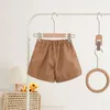 Shorts barn flickor pu läder shorts khaki svart lös läder korta byxor aurumn vinterkläder barn tonårshorts 230512