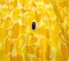 Yeni Erkek ve Kadınlar Popüler Logo Kamuflaj Baskılı Sarı Ergen Kişilik Kısa Kollu Yuvarlak Yuvarlak Tişört
