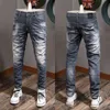 Fade Jeans elasticizzati vintage strappati gamba slim fit da uomo