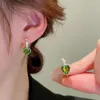 boucle d'oreille féminine verte d'eau