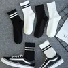 Women Man Socks Wholesale Men Compression Cotton Unisex White Black Crew Kvinnlig manlig solid färg Kort bomullsrumma randiga Soks vår sommar Sox