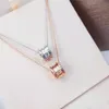 Klassieke Europese en Amerikaanse lente damesketting diamant keramiek hanger meisjes vakantiegeschenk 316L roestvrijstalen banddoos
