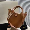 Sacs de soirée mode Vintage Pu cuir couleur unie épaule bandoulière pour femmes lumière luxe Shopping seau sac à main 2023 230427