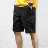 Męskie szorty solidny kolor szeroką nogę multi kieszenie mężczyzn luźne spodnie letnie guziki wystrój