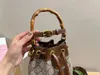 MT Designers Bambu Bucket Bag Top Luxo Crossbody Bolsas Bolsa Mulheres Mini Moda Bolsas De Couro Atacado Alça De Ombro Removível 19cm