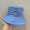 bucket hat designer bucket hat Triangle logo acrylic fabric waterproof sunscreen fisherman hat in a variety of colors