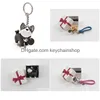 Keychains Bolyards Creative Puppy Keychain Gift Backpack Pinging Key Pingente para a família e amigos Dog Anel com caixa de 12 estilos D DHB10