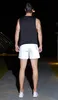 Herr shorts mode färgglada reflekterande färg förändrade shorts mäns hip hop luminous jogging säker sport tight run yoga fitness byxor 230512
