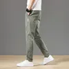 Męskie spodnie wiosna lato bottomowe spodnie męskie mody klasyczny sznur elastyczny pasa jogging cienki rozciąganie swobodne szare mody menu 230512