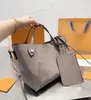 7a topkwaliteit vrouwen 2023 Tote Bag Mahina Blossom MM M54353 met afneembare zip -zak geperforeerde monogrammen patroon Galet Bag luxe handtas