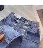 Shorts pour femmes 2023 femmes Sexy taille haute poche jean coréen mince Double boutonnage cordon Design Denim Feminino