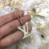 Роскошное бренд Письмо Письмо цветы подвесной ожерелье дизайнер модная золотая тарелка Простые ожерелья Свадебная вечеринка Crysatl Jewerlry Ожерелье VN-0120