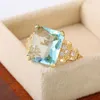 Wedding Rings Zhouyang Ring voor vrouwen Luxe licht Gold kleur blauw zirkoon op vingers sieraden geschenk groothandel accessoires KBR41