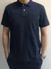 Nouveaux T-shirts pour hommes Polo d'été à manches courtes Haut à manches courtes Col polo brodé solide T-shirt à manches courtes pour hommes à deux boutons