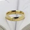 結婚指輪シンプルな金色のステンレス鋼カップルcz石