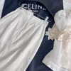 Australischer Designer-zweiteiliger Kleid entwirft das neueste dreidimensionale Blumendekorationsleinentop für Frühling und Sommer mit hoher Taille und Gesäß