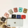 Lat person mobiltelefon ringfästet tio färg lager material kan skrivas ut med logotyp