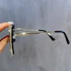 Zonnebrillen metalen frame randloze zonnebril voor dames mode retro merkontwerper Sun Visors voor dames glanzende bril 230512