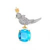 Broches femelle Simple bleu cristal oiseau pour femmes luxe jaune or argent couleur Zircon alliage Animal broche épingles de sûreté