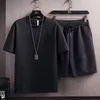 Tute da uomo Set da uomo estivi Moda coreana Set da 2 pezzi Tute da uomo Casual Abbigliamento da uomo Pantaloni da jogging T-shirt scozzesi Pantaloncini da uomo Set 230515