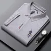 Polos de algodón bordado de la marca para hombres POLOS Camiseta de algodón de alta gama de la algodón de lujo para hombres Camiseta de manga corta de la manga corta Men 230515