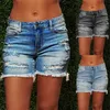 Women's Shorts Blue Ripped Denim Shorts With Tassel Pockets Women Summer Streetwear High Waist Button Up Sexy Hole Rave Jean Shorts 230515