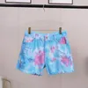 Kvinnors shorts Kvinnor Medium midjeljus tvättad slips färgad tasshål denim shorts kvinnlig klippa ut super shorts nattklubb 230512