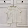 23ss enfants vêtements de marque bébé ensemble enfant ensembles revers Petite fleur Amour broderie Chemise à manches courtes Taille élastique Broderie short costume Vêtements de bébé de haute qualité