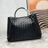 Bolsos de compras de diseñador Andiamo Tote mediano Hombro de mujer Tejido de cuero de becerro Bolso cruzado de moda Bolsos de alta calidad Nuevo s2fsd