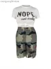 Survêtements pour femmes LW Plus Size Camo Deux Pièces Lettre Imprimer T-shirt Blanc À Manches Courtes Camouflage Tassel Design Trendy Shorts Set Maxi 2pcs T230515