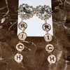 Boucles d'oreilles pendantes strass lettre riche avec coeur breloques pour femmes bijoux défilé de mode fête déclaration accessoires