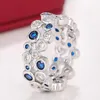 Anneaux de mariage Huitan Mode Blanc/Bleu Zircon Cubique Femmes Argent Couleur Bande Accessoires Spécialement Intéressés Bijoux À La Mode