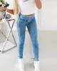 Kvinnors jeans eyele spetsiga mager kvinnor denim byxor hög midja sexig smal vår sommar